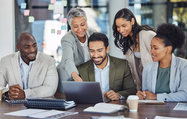 meeting laptop happy business people office planning marketing strategy working together teamwork diversity group workers with computer report cooperation project 590464 149935